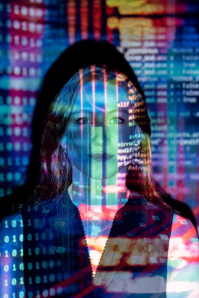 A woman with digital code projections on her face, representing technology and future concepts.
